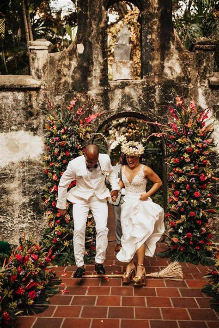Jumping the Broom from Best Movie Wedding Dresses of All Time E! News